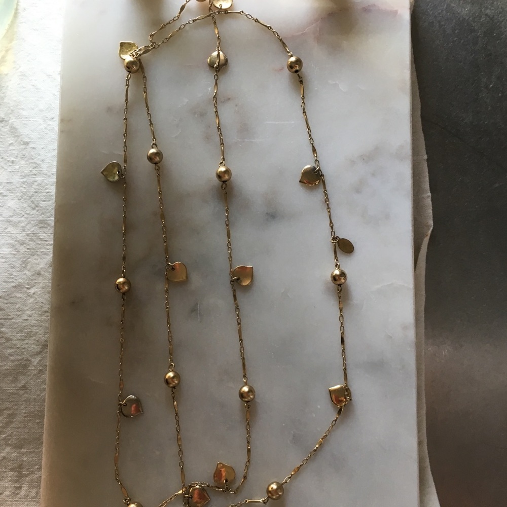 Express Long gold necklace with leaves